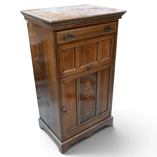 A LATE VICTORIAN ROSEWOOD AND INLAID MUSIC CABINET.