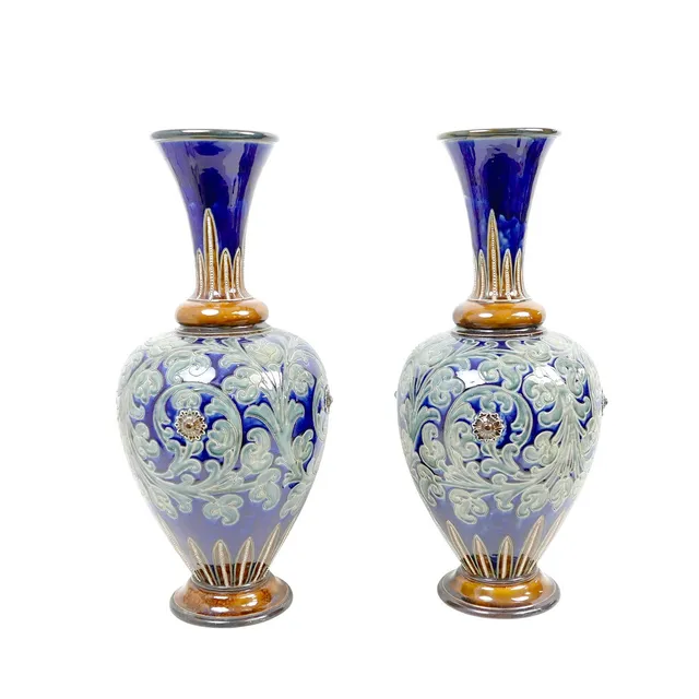 A PAIR OF 19TH CENTURY ROYAL DOULTON LAMBETH WARE VASES.