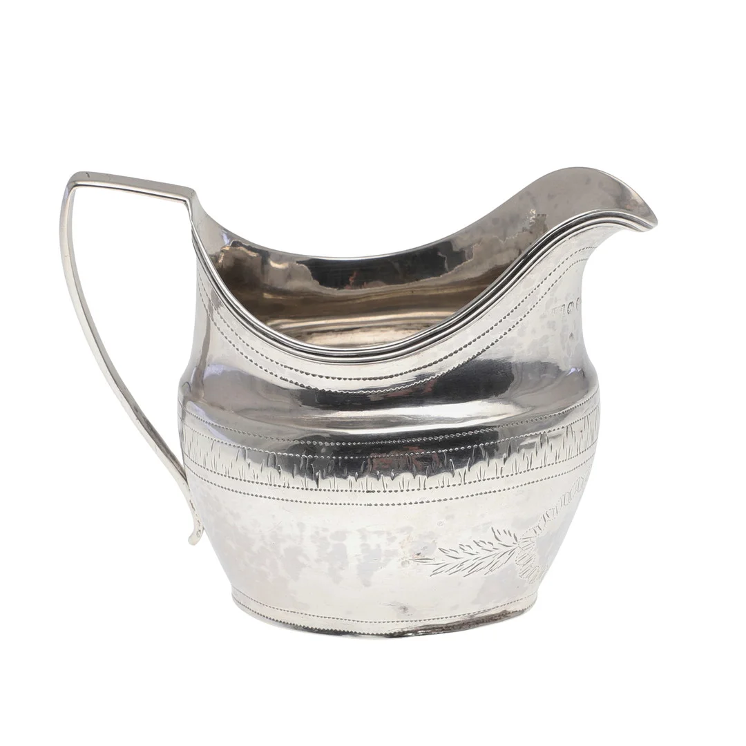 A GEORGE III SILVER CREAM JUG. — Silver — Lawrences Auctioneers