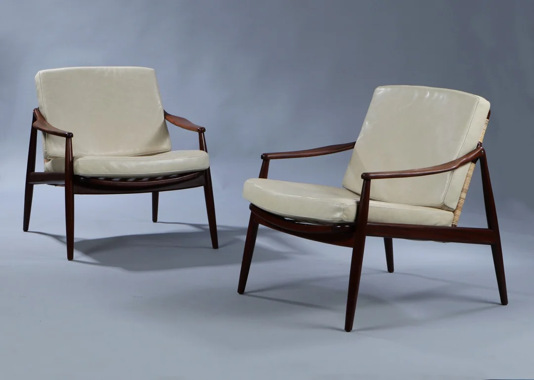 Hartmut Lohmeyer for Wilkhahn. A pair of teak and wicker lounge chairs (2) — Furniture/Lounge chairs — Lauritz