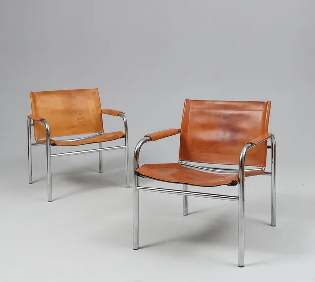 TORD BJÖRKLUND. Fåtöljer, ett par, kromat stålrör och skinn, "Klinte", IKEA, 1900-talets andra hälft.