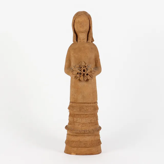 IRMA YOURSTONE. Figurin, lergods, signerad.