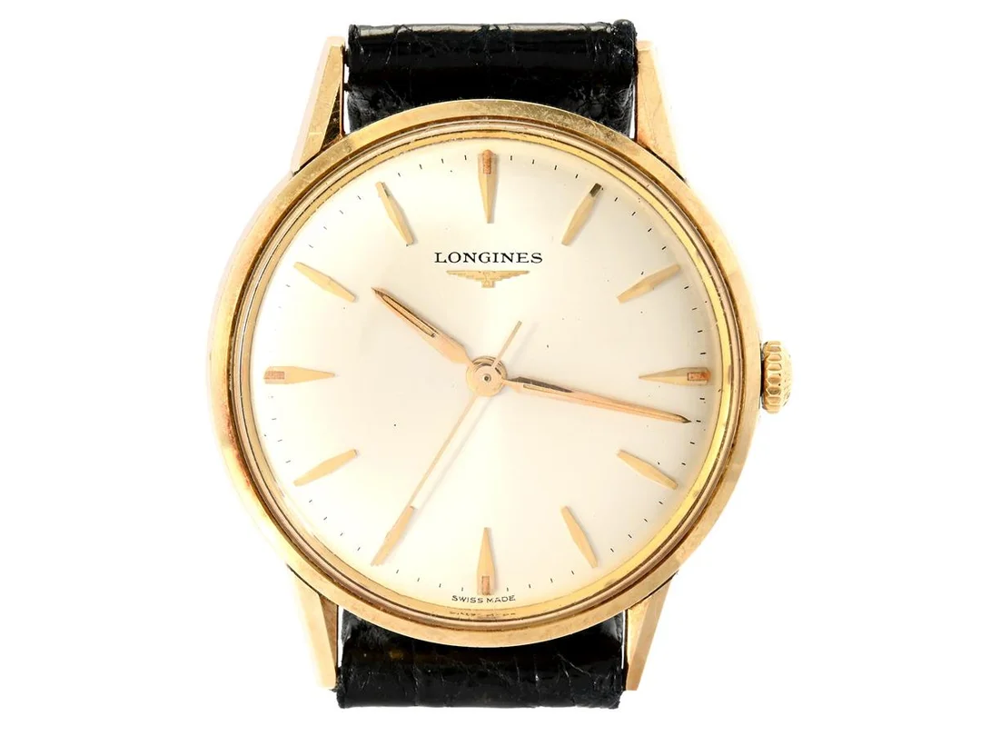 LONGINES, herrur, 35 mm, Cal 280, Serie nr. 11535344, Boett nr. 7074 2 / 75, 14K guld, manuell, plexiglas, läderband, originalspänne i doublé (ej tidsenligt), ca 1960. — Klockor/Longines — Kaplans