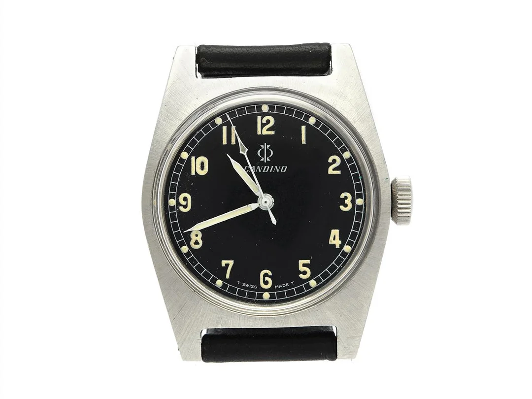 CANDINO, " T Swiss Made T", "Tre Kronor", herrur, 35 mm, Cal ETA 2750, Ref nr. 10511, Boett nr. 2031, stål, manuell, plexiglas, skadad urtavla, gravyr (Tre Kronor), läderband, ca 1968. — Klockor/Candino — Kaplans