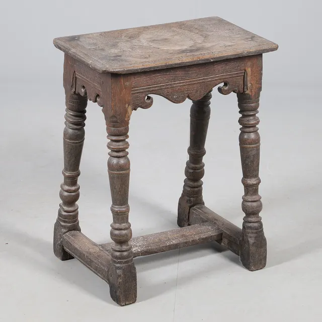 A RARE 17TH CENTURY OAK & ELM JOINT STOOL.