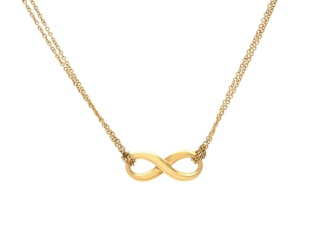 TIFFANY & CO, collier, Infinity, 18K guld, längd 41 cm, vikt 4,7 g. — Smycken/Collier — Kaplans
