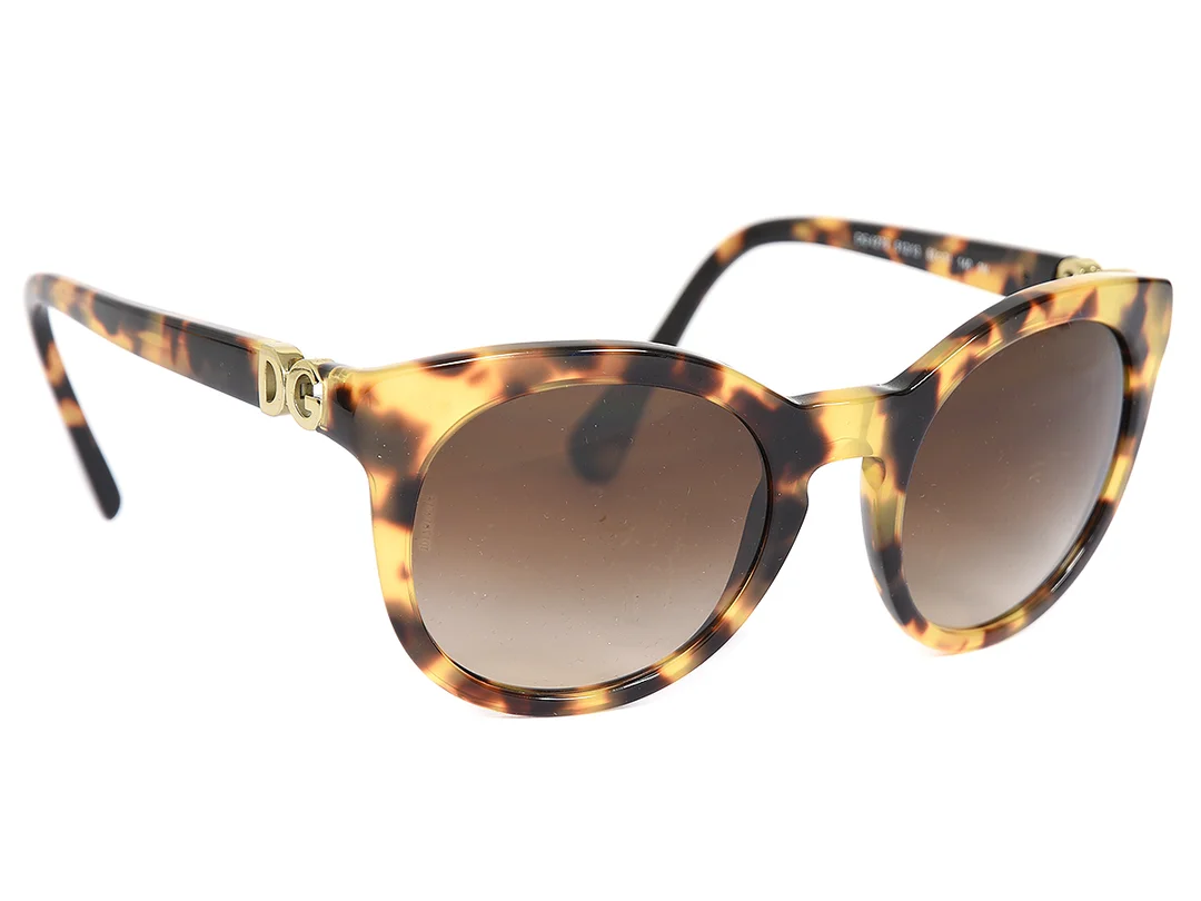 SOLGLASÖGON, DOLCE & GABBANA, DG 4279, 512/13, 52 21, melerade bågar, bruna glas, etui. — Accessoarer/Solglasögon — Kaplans
