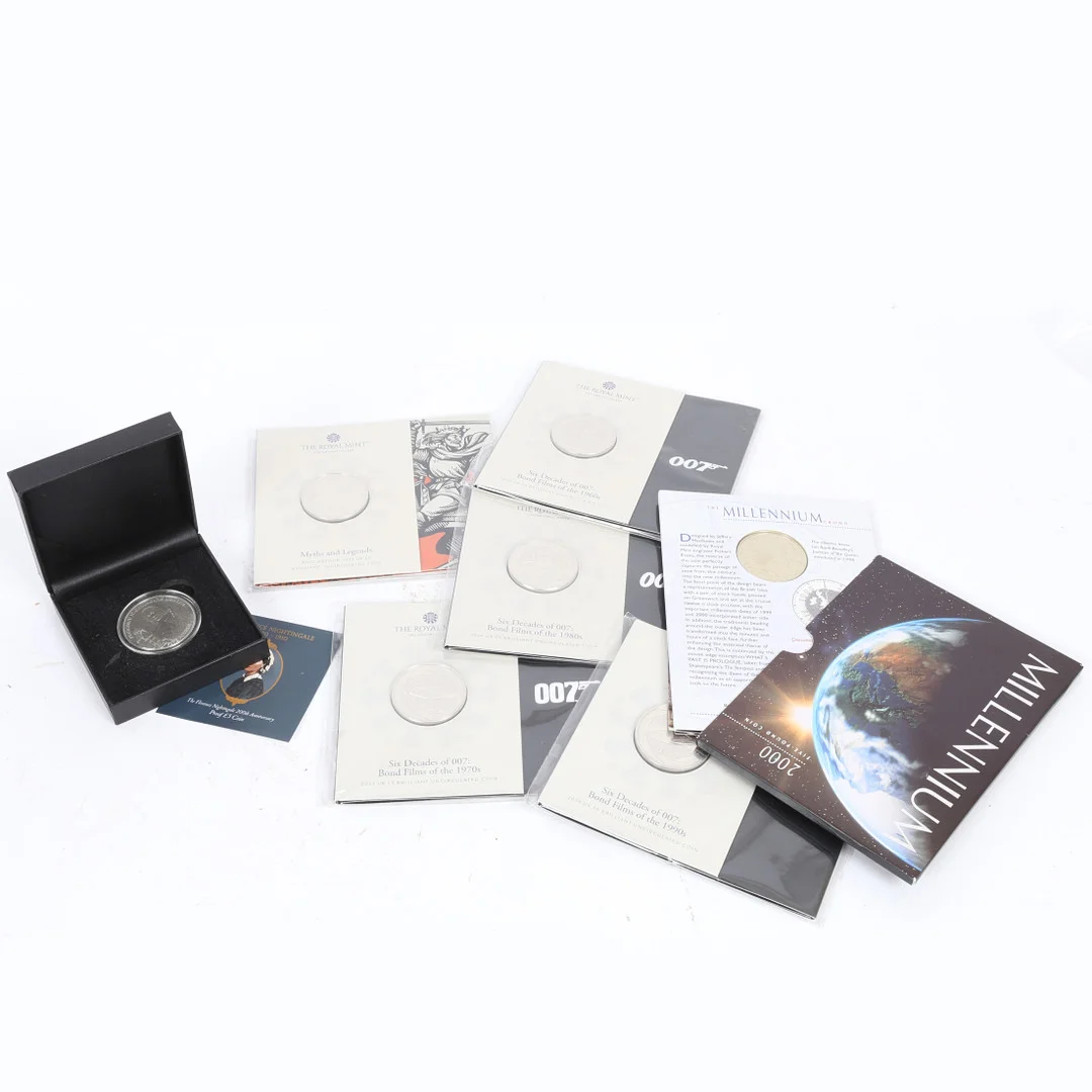 UNCIRCULATED FLAT PACK FIVE POUND COIN SETS (7). — Coins & Banknotes — Bishop & Miller