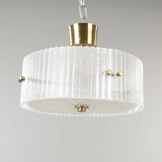 CARL FAGERLUND. Taklampa, mässing och glas, Orrefors.
