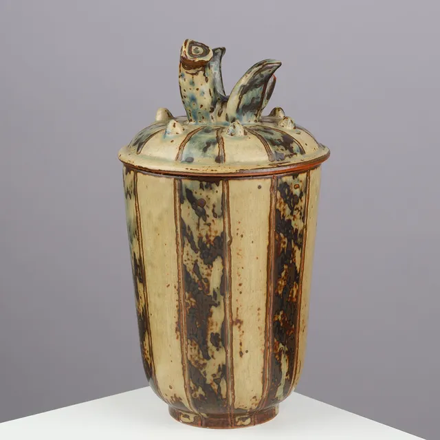 THORKILD OLSEN (1890-1973). Unique lidded jar decorated with mythical creature, stoneware glazed in Sung glaze, Royal Copenhagen, Denmark, dated 1948.