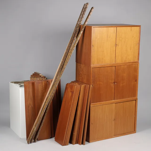 POUL CADOVIUS (1911-2011). Reolsystem af teak, "Royal System", Danmark, 1900-tallets midte (20+44).