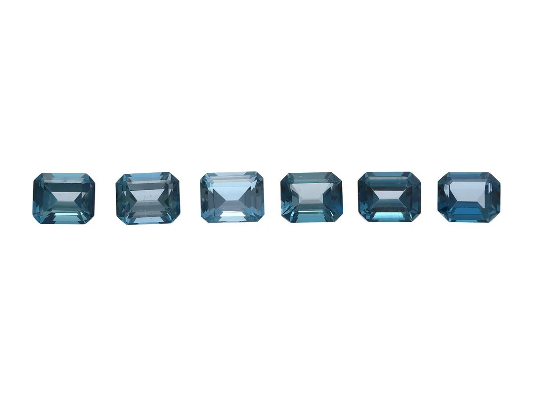 TOPASER, 6 st, London blue 33,3 ctv, mått ca 9,00x11,00 mm, små nagg. — Ädelstenar/Topas — Kaplans