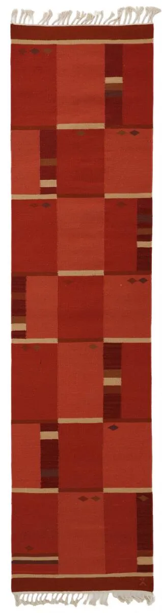 Handwoven wool runner in “rölakan” flatweave technique. Geometric pattern in shades of red. Signed Å. Made by Axeco. L. 300 cm. W. 76 cm.