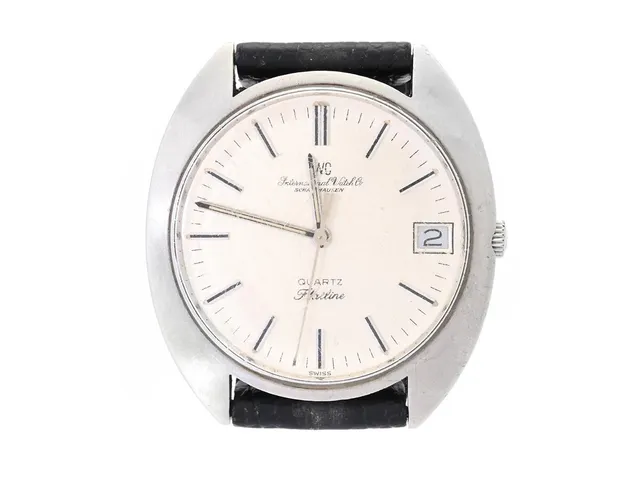 IWC, International Watch Co. Schaffhausen, Flatline (Swiss), Cal 2405, Serie nr. 2293154, Boett nr. 2263082, herrur, 35 mm, stål, quartz, plexiglas, datum, skadad urtavla, läderband, ca 1980.