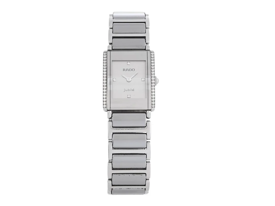 RADO, Integral, Jubilé, Serie nr. 05090604, PIC nr. R20430722, Boett nr. 153.0430.3, damur, 18 x 22 mm, high-tech ceramica, quartz, safirglas, diamanturtavla (4 st. 8/8), briljanter (38 st.), originallänk, viklås i titan, Ref nr. 04443, cert, april 2003. — Klockor/Rado — Kaplans