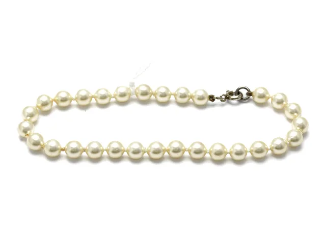 Armband med syntetiska pärlor 18cm