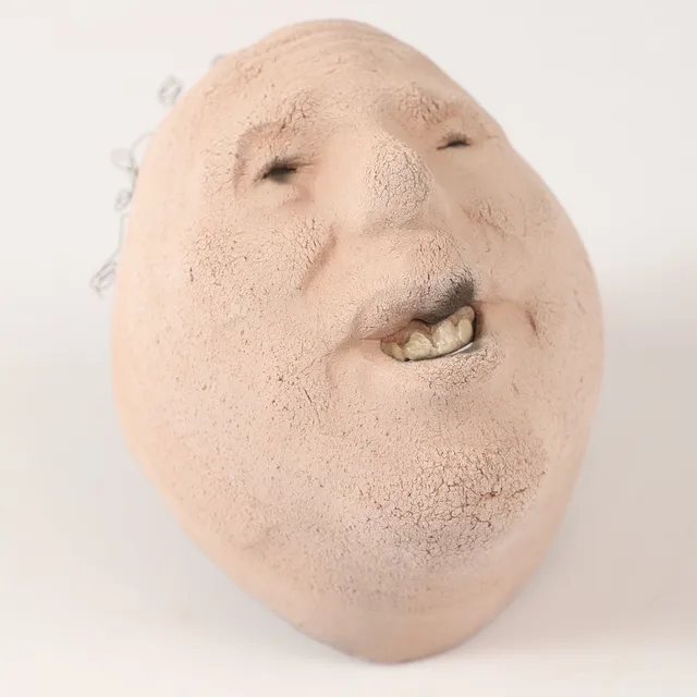 JOHAN THUNELL. Skulptur, ansikte, stengods, signerad.