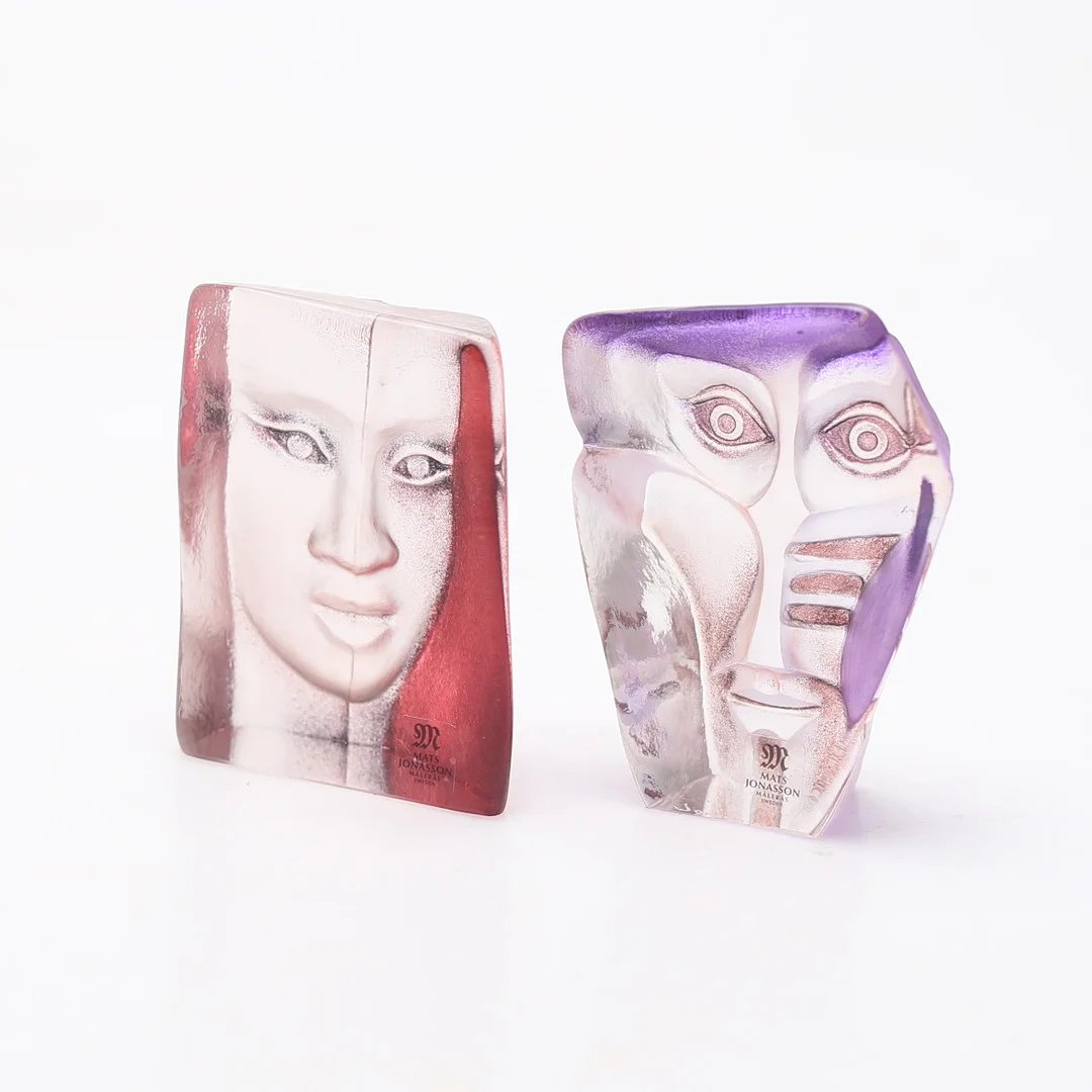 MATS JONASSON. Skulpturer, 2 st, glas, ur Masq kollektionen, Målerås, signerade. — Art glass — Gomér & Andersson Linköping