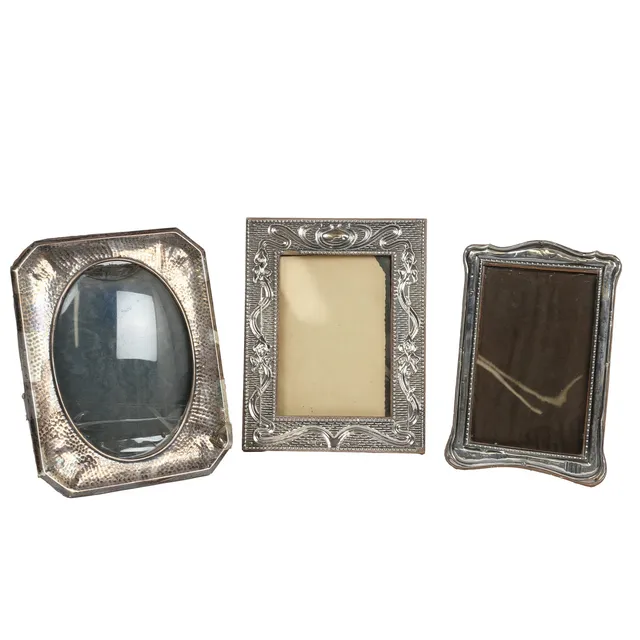 THREE SILVER PHOTOGRAPH FRAMES TO INCLUDE AN ART NOUVEAU EXAMPLE (3).