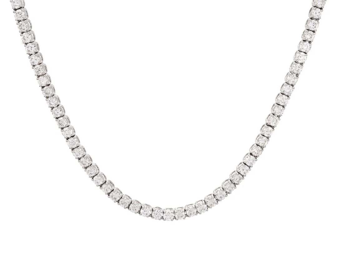 RIVIERECOLLIER, 18K vitguld, 170 briljantslipade diamanter ca 6,80 ctv, ca TW-W/VS-P, längd 42,5 cm, vikt 16,0 g. — Smycken/Collier — Kaplans