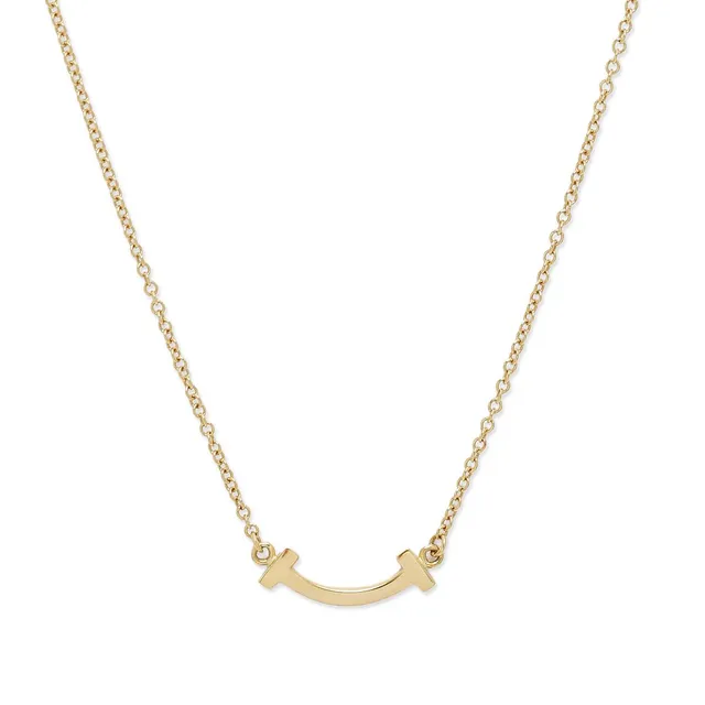 A “T Smile” necklace of 18k gold. Weight app. 2.3 g. L. 40.5–45.5 cm.