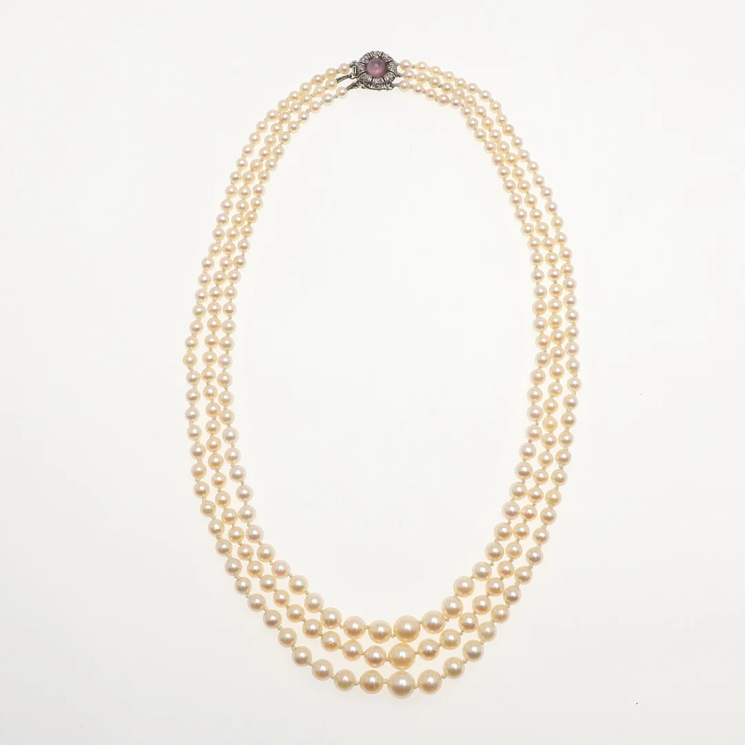 A THREE ROW GRADUATED CULTURED PEARL CHOKER. — Necklace — Lawrences Auctioneers