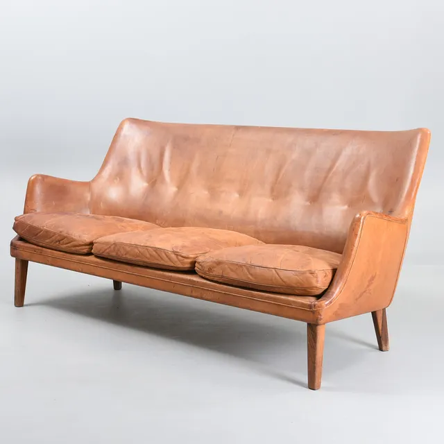 ARNE VODDER. Model AV-53 freestanding three-seater sofa with rosewood legs. Executed by upholsterer Ivan Schlechter. Denmark. 1950s.