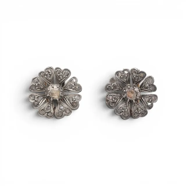 Pair of diamonds floral clip-brooches, late 19th Century.