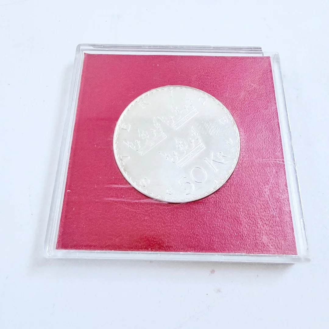 JUBILEUMSMYNT, "50 kr", Sterlingsilver, 1975. — Coins & Banknotes — Auktionshuset STO Bohuslän