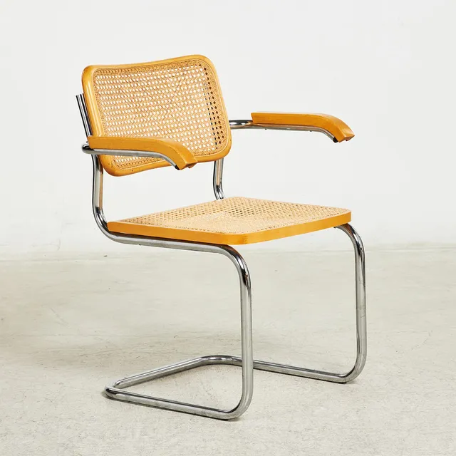 MARCEL BREUER. EFTER. Karmstol "Cesca B32", märkt "Made in Italy", kromad stomme samt bok och rotting.