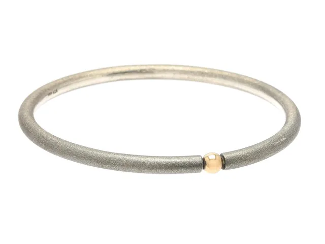 ARMRING, sterlingsilver/18K guld, innermått 6,5x7,5 cm, vikt 43,3 g.