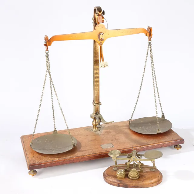 A PAIR OF GRAVE SHORT & CO "COUNTY OF MIDDLESEX" SCALES TOGETHER WITH A SMALL PAIR OF POSTAGE SCALES.