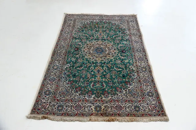 Persian Nain rug. L: 300 cm W: 193 cm.