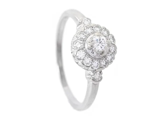 RING, 18K vitguld, briljant- och åttkantslipade diamanter, 0,48 ctv enligt gravyr, ca TW/VS, stl 19 mm, vikt 3,7 g,