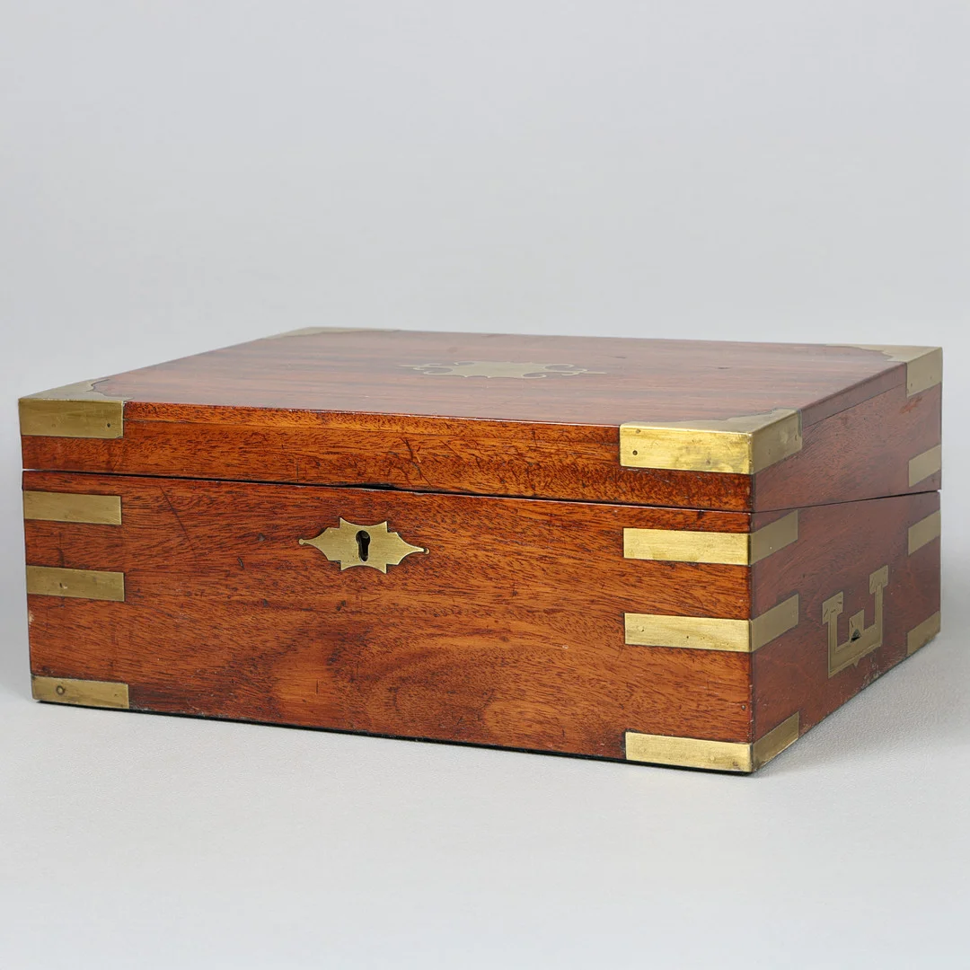 A REGENCY MAHOGANY AND BRASS BOUND WRITING SLOPE. — Other collectables — Bishop & Miller