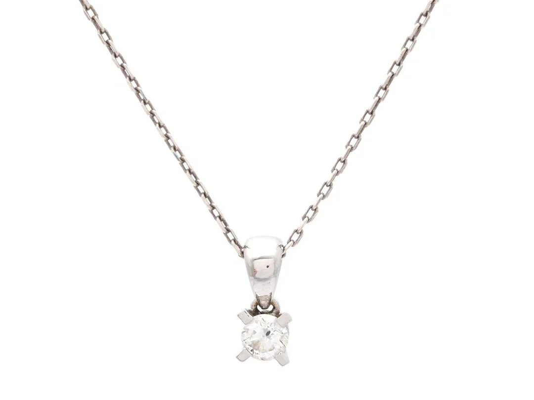 ENSTENSHÄNGE, 18K vitguld, briljantslipad diamant ca 0,18 ct, ca W/P, vikt 0,6 g, kedja i sterlingsilver, längd 42 cm. — Smycken/Hänge med kedja — Kaplans