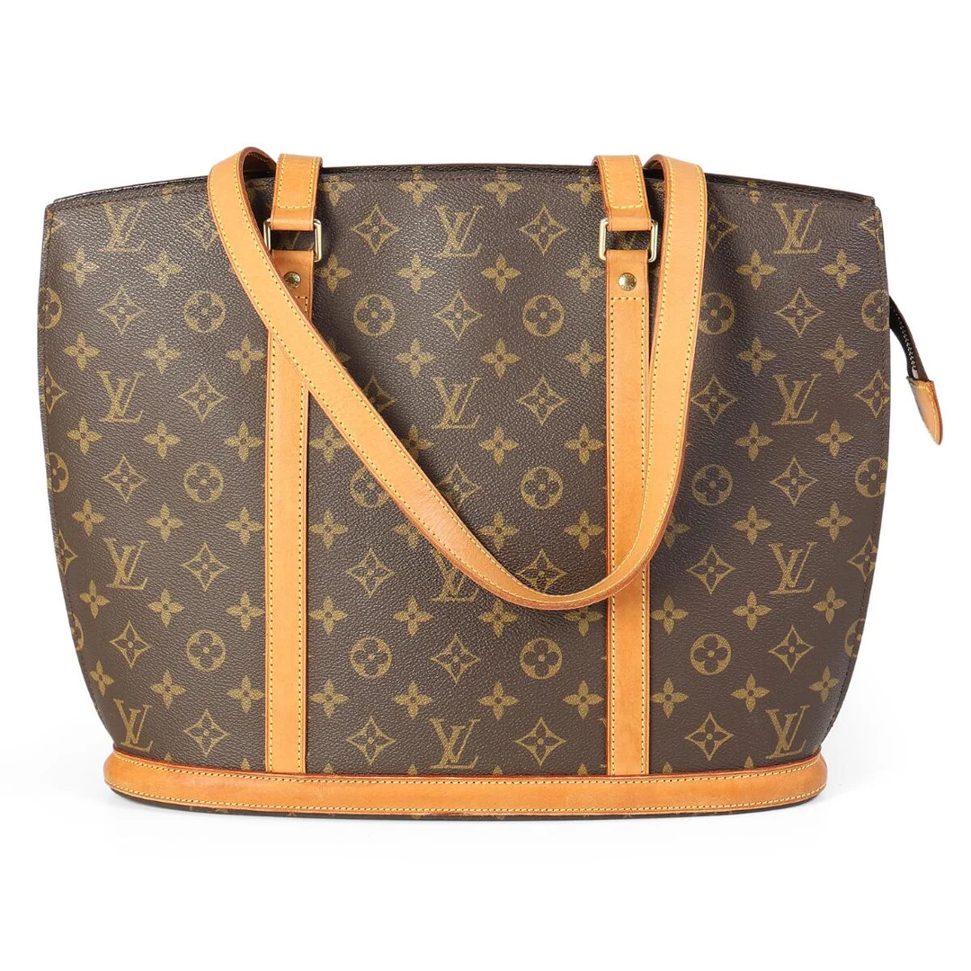 Louis Vuitton: A “Babylone” bag of brown monogram canvas with brown leather trimmings. 2000. — Designer Handbags & Fashion/Designer Handbags — Bruun Rasmussen