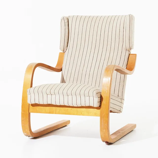 ALVAR AALTO. Fåtölj modell 401, 1940-50-tal, Artek, designår 1933, skiktlimmad björk med textilklädsel.