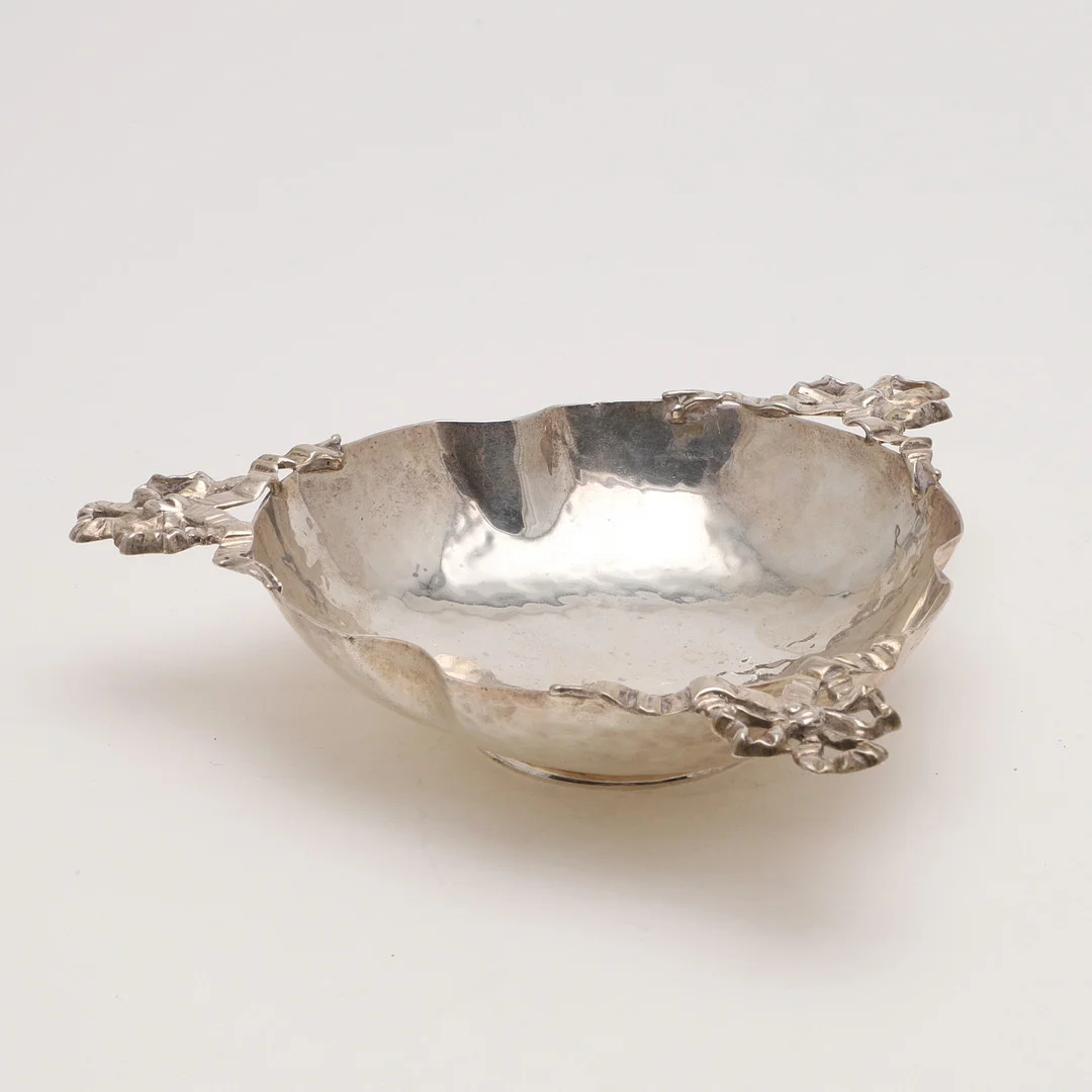 AN EDWARDIAN HAMMERED BOWL. — Silver — Lawrences Auctioneers