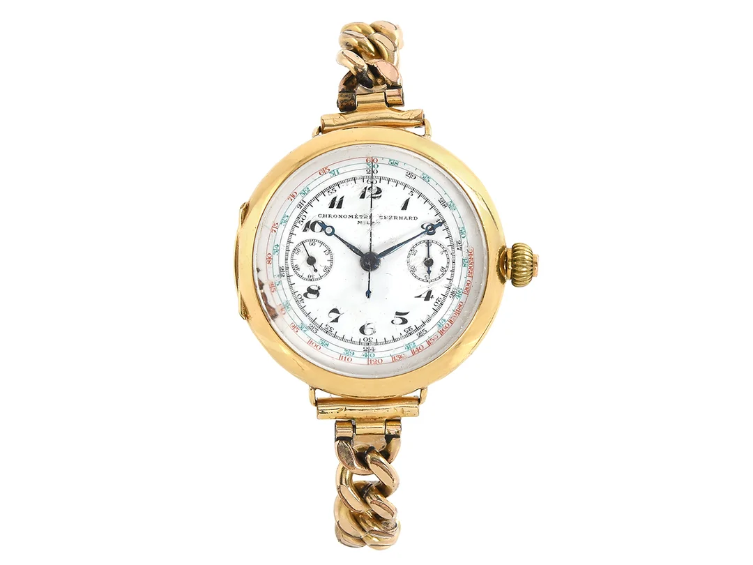 CHRONOMÈTRE EBERHARD, Milan, "Monopusher", Cal Valjoux 22-GH 15 3/4, Boett nr. 1997, enknappskronograf, herrur, 39,5 mm, 18K guld, manuell, plexiglas (skadat), bucklor boett, ca 1920, integrerad metallänk (ej original). — Klockor/Eberhard & Co — Kaplans