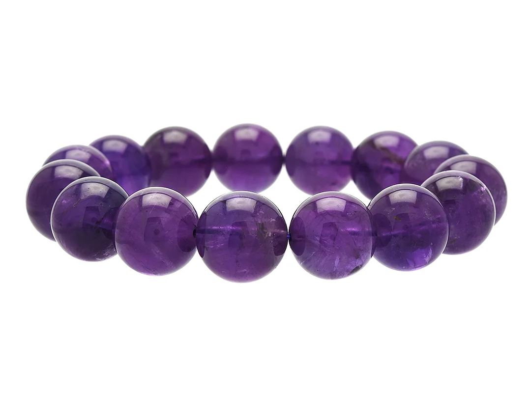 ARMBAND, ametist, kulor ca 14 mm, stretchband, vikt 58,7 g. — Smycken/Armband — Kaplans