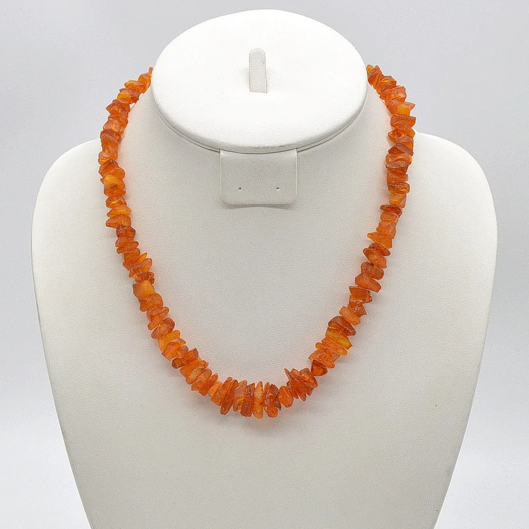BERNSTEIN COLLIER, SCHRAUBGEWINDE, UNPOLIERT, VINTAGE, CA. 48CM. — Necklace — Kunst- und Auktionshaus Kleinhenz