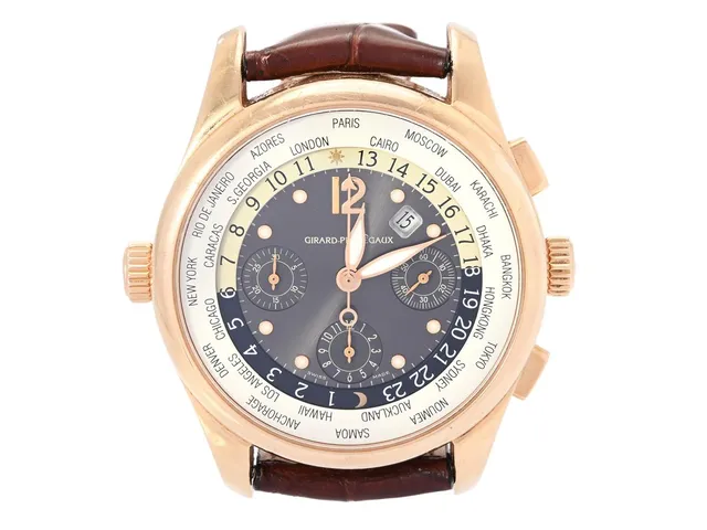 GIRARD-PERREGAUX, WW.TC "World Time Chronograph", Cal 3387, Verk nr. 02017, Serie nr. 873, Ref nr. 4980, kronograf, herrur, 43 mm, 18K rosa guld, automatisk, safirglas (repor/nagg), datum, 24-timmarsvisning, världstider, glasbaksida, läderband, originalspänne i 18K rosa guld, ca 2003, service-etui