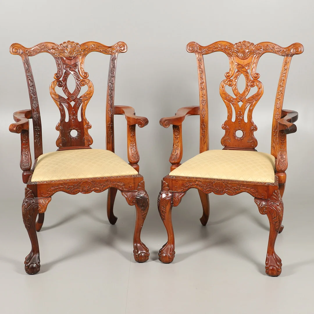 A PAIR OF CHIPPENDALE STYLE CARVED MAHOGANY ELBOW CHAIRS. — Armchairs & Chairs — Lawrences Auctioneers