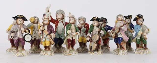 Capodimonte, after Meissen: A collection of 12 figures depicting a monkey orchestra (12)