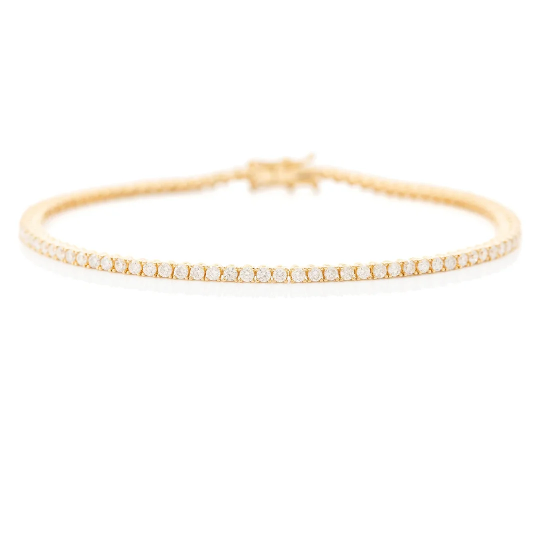 Tennisarmband 18K guld med runda briljantslipade diamanter. — Smycken/Armband — Bukowskis