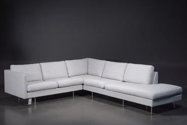 Søren Lund. Corner sofa upholstered in grey-striped furniture fabric