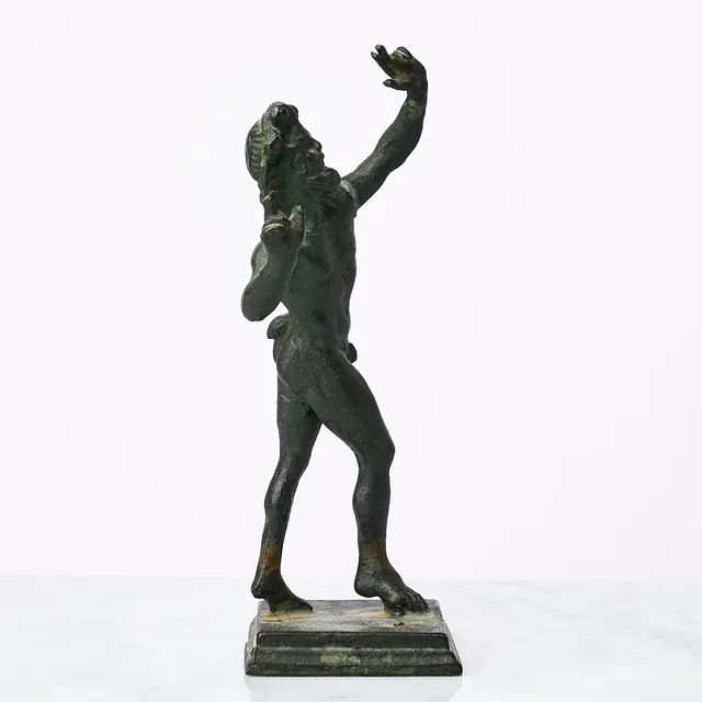 FAUN, 1800/1900-tal, efter den romerska förlaga som hittades i vulkanstaden Pompeji, patinerad brons.