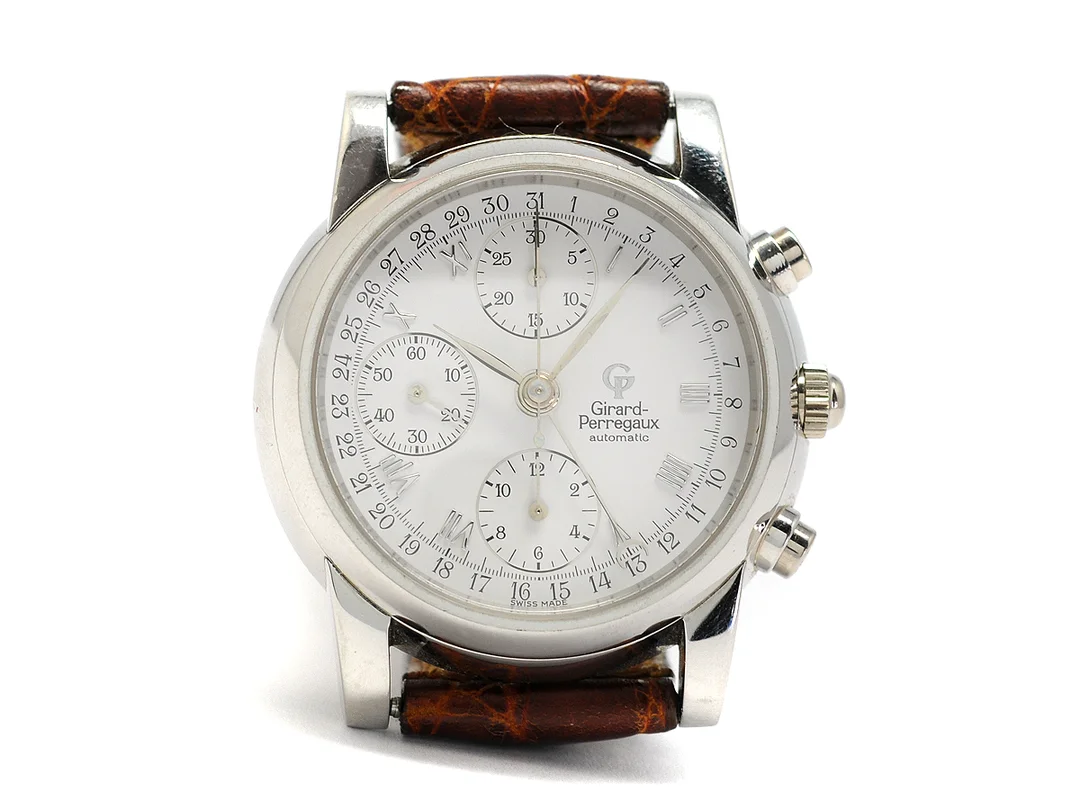 GIRARD-PERREGAUX, kronograf, Cal GP 8280 (Valjoux 7750), Ref nr. 9000, Boett nr. PT-17, herrur, 40 mm, platina, automatisk, safirglas, datum, glasbaksida, läderband, originalspänne i 18K vitguld, ca 1995. — Klockor/Girard-Perregaux — Kaplans