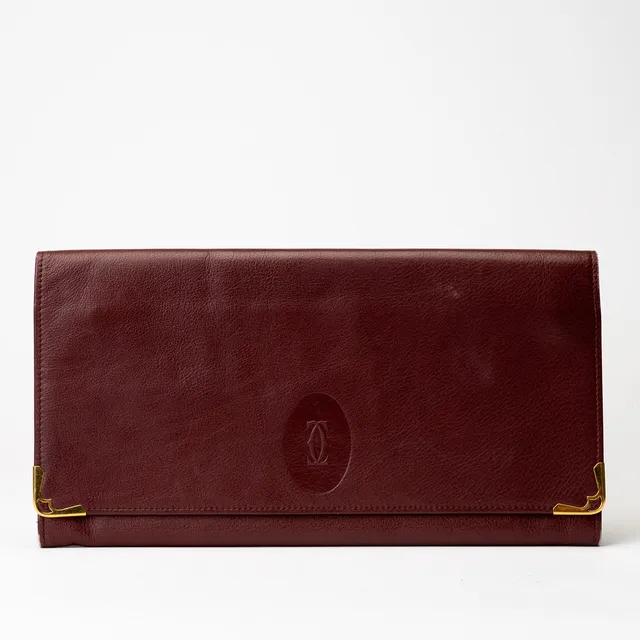 LE MUST DE CARTIER, dokumentväska, bordeaux-färgat skinn, 1980/90-tal.